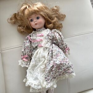 Vintage Floral Porcelain Doll with Pink Accents